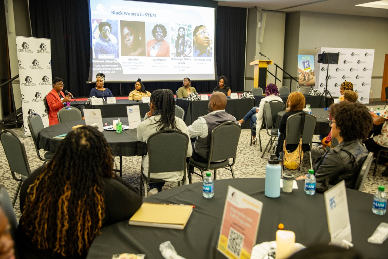 Table of girls attending the Girls For A Change Black Girl Rally