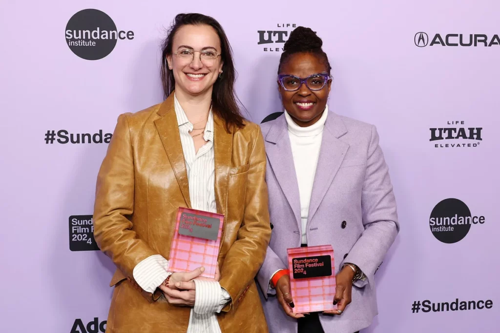 Natalie Rae and Angela Patton hold their Sundance Film Festival Award for 'Daughters' documentary